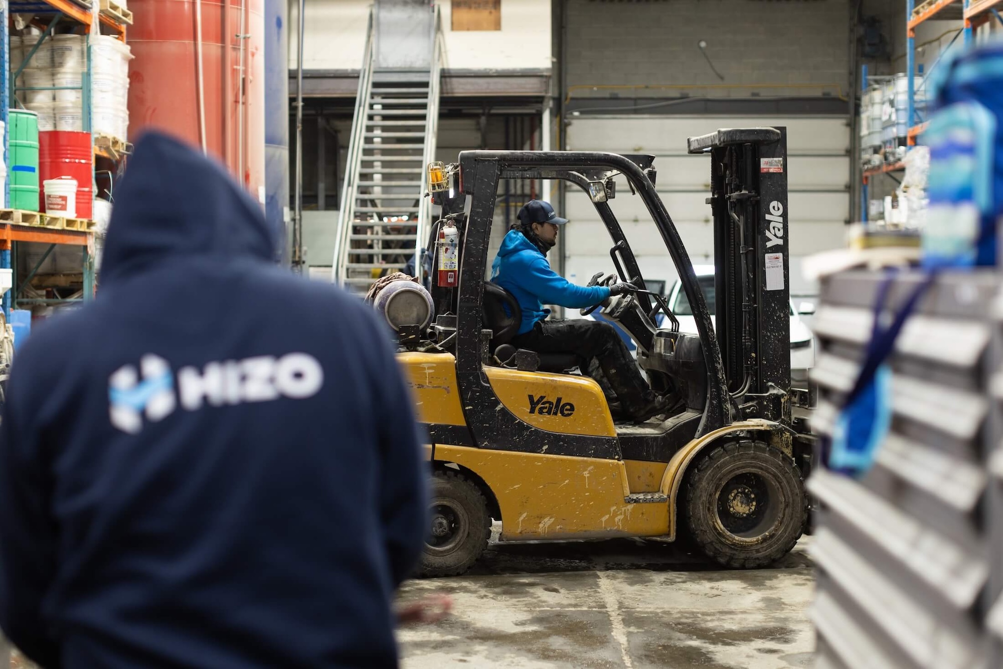 HIZO team preparing insulation materials in warehouse