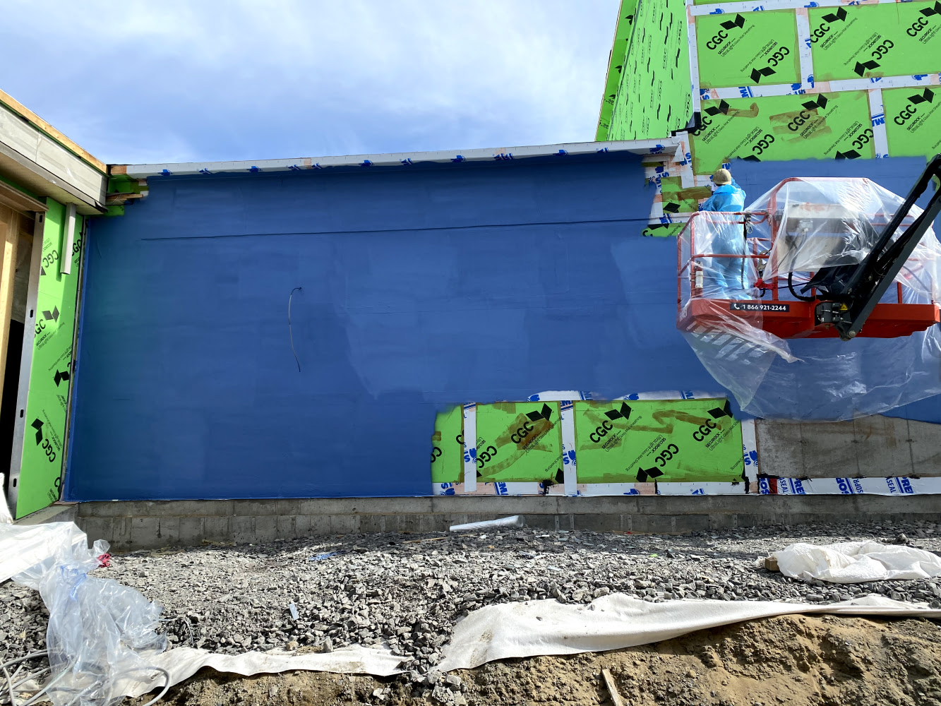 Liquid air barrier membrane commercial building Quebec HIZO