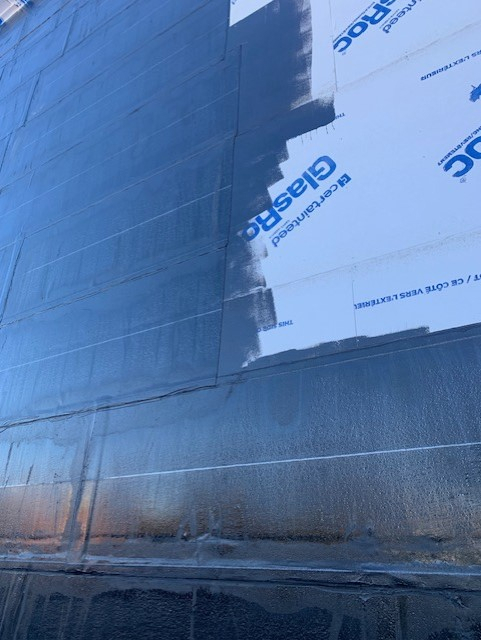 Torch-applied waterproof membrane building Quebec HIZO