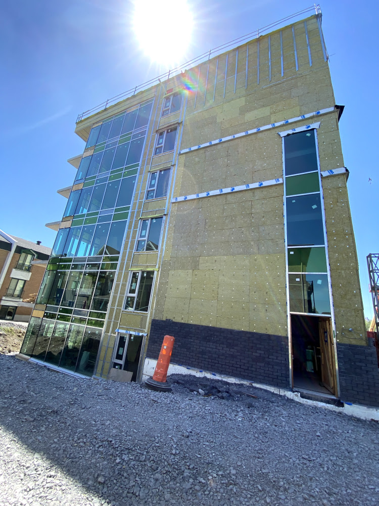 Exterior wall insulation commercial building Quebec HIZO